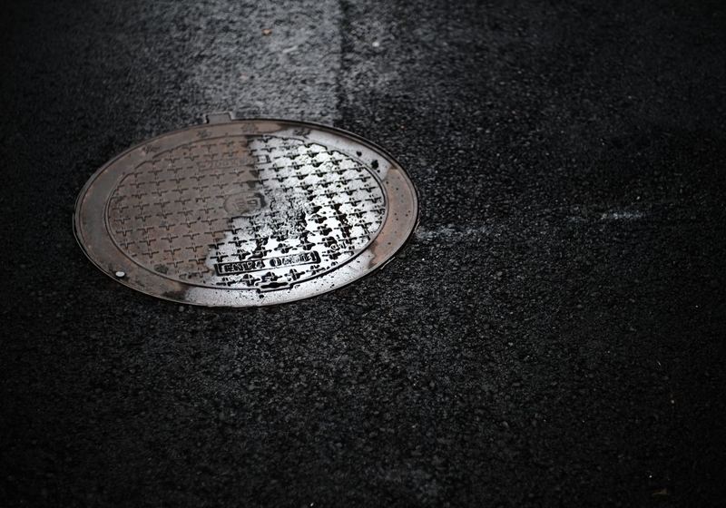 Storm drain in a wet street